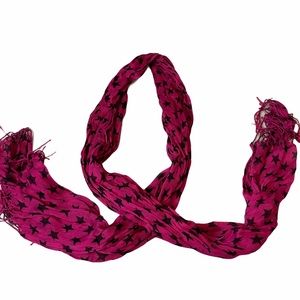 Pink scarf with black stars on it